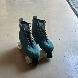 Teal Roller Skates with Black and White Accents